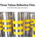 Tough As Nails Traffic Safety Bollard Post with bright yellow reflective tape on stainless steel surface for visibility.