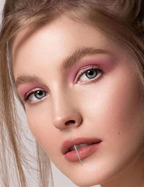 Close-up of a woman with a stainless steel lip piercing taper from the 4 Piece Stainless Steel Piercing Taper Kit With Internal Threaded External Threaded And Push In Pin Insertion Pins 14G 16G 18G For Lip Nose Ear Navel Eyebrow Nipple Tongue Body Piercing Tool Set.