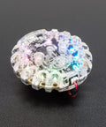 Dope Clear Shield Case For Circuit Playground Express And Bluefruit Boards Snap Fit Electronics Housing showing colorful LEDs illuminated.