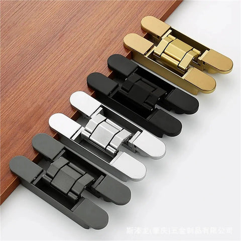 Dead Nuts Strong 3D Adjustable Concealed Door Hinges in various finishes on a wood surface for sleek operation.