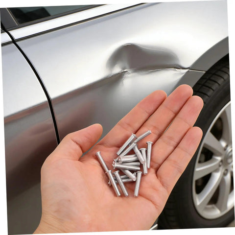 Get Those Dings Gone With These 50 Silver Metal Car Body Repair Welding Studs 4mm in hand near a dented car door.