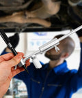 DIY Auto Body Dent Repair Kit With Wheel Arch Marker And Iron Tool For Sheet Metal Restoration in use by mechanic