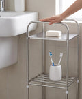 Floor Standing Metal Storage Rack For Laundry And Home Organization Movable And Rust Resistant Minimalist Shelving Unit