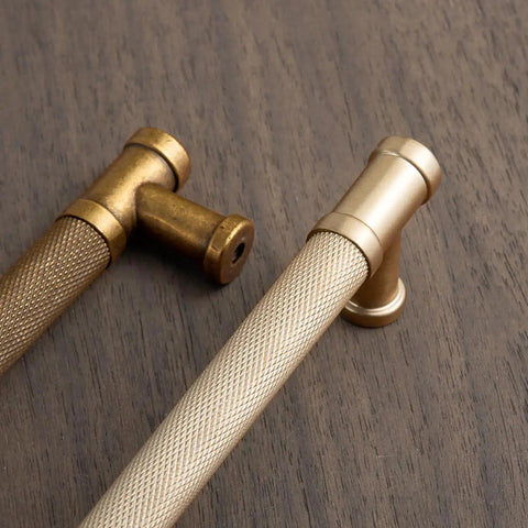 Close-up of knurled handles from Six Pack Champagne Bronze Knurled Cabinet Pulls Set, 18 Inch Center To Center, Modern Bar Cabinet Drawer Handles