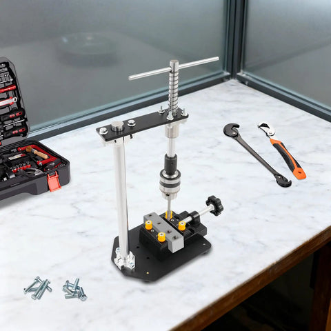 Manual Tapping Machine for DIY and Workshop on marble surface with 6 taps and vise, heavy duty steel build, great for metalworking projects.