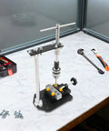 Manual Tapping Machine With Adjustable Precision Hand Tapper Vertical Tapping Tool on workshop table with tools
