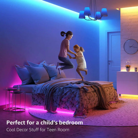 Rgb Led Light Strips 32.8 Ft With 44 Key Remote Color Changing Tape Light illuminating a child's bedroom for decor.