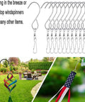 24 Piece Swivel Clip Hanging Hooks With Dual Rotation And Spiral S Shape Design Includes Sturdy Plastic Storage Bin For Zero Fuss Home Organization That Works Like A Charm in a garden setting.