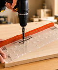 Hefty Duty Shelf Pin Jig Kit 18 9 Inch Acrylic Drill Guide in use with drill on wood surface for cabinet installation.