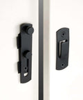 Two Pack Matte Black Stainless Steel Barn Door Latches 3.93 by 2.75 Inches Flip Bi Fold Sliding Door Lock installed view