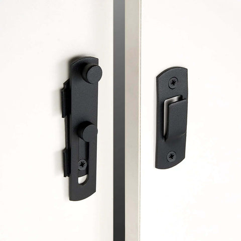 Two Pack Matte Black Stainless Steel Barn Door Latches 3.93 by 2.75 Inches Flip Bi Fold Sliding Door Lock installed view
