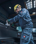 Worker using Five Eighths Inch Beveling Tool With Variable Speed And One Touch Depth Control Vario Tacho Constamatic Full Wave Electronics.