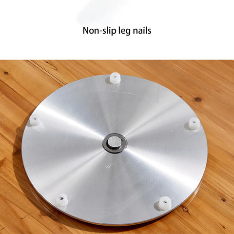 Bottom view of Tempered Glass Lazy Susan Turntable with aluminum base and non-slip leg nails for smooth rotation.