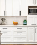 Modern kitchen with white cabinets featuring 5 Pack 10 Inch Matte Black Square Cabinet Pulls Stainless Steel Kitchen Cupboard Dresser Handles.
