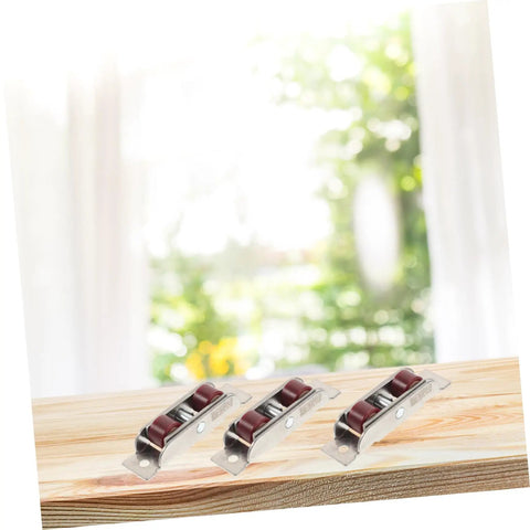 Heavy Duty Stainless Steel Sash Roller Double Wheel Pulley 4 Pack for Sliding Windows and Doors Smooth Silent Operation. Three rollers on wood.