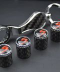 Porsche Dope Carbon Fiber Valve Stem Caps 4 Pack With Resin Red S Emblem Trim Rotates 360 Degrees And Fits Porsche Models with keyring tool