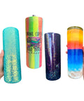 Four colorful 12oz tumblers showcasing artistic designs, coated with Grande Finale Tumbler Coat Gloss Finish For 12oz Tumblers.