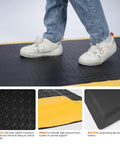 Person standing on Built Tough Heavy Duty Anti Fatigue Standing Mat 3 Ft By 7 Ft With Diamond Plate Texture Ergonomic Memory Foam Cushioned Floor