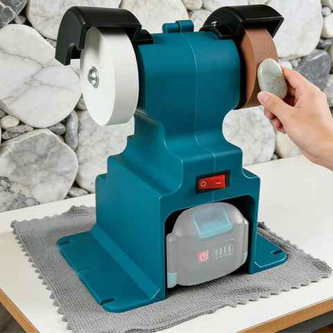 Get Your Hands on This Badass Cordless Mini Bench Grinder on a table, showing dual grinding wheels and battery compartment.