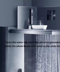 Heavy Duty Wall Mounted Shower System With Instant Electric Water Heater And No Sweat Constant Temp Control Featuring Dual Shoulder And Bidet Sprayers For A Smooth Next Level Bath Setup In Black with elegant design and flowing water.