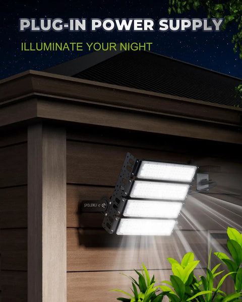 Zero Maintenance Industrial LED Stadium Light 200W Flood Beam 32,000 Lumens IP66 mounted on building, illuminated at night