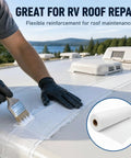 Person applying Heavy Duty Polyester Roof Reinforcement Fabric 40X162 Ft White Elastomeric Coating Sealer on RV roof.