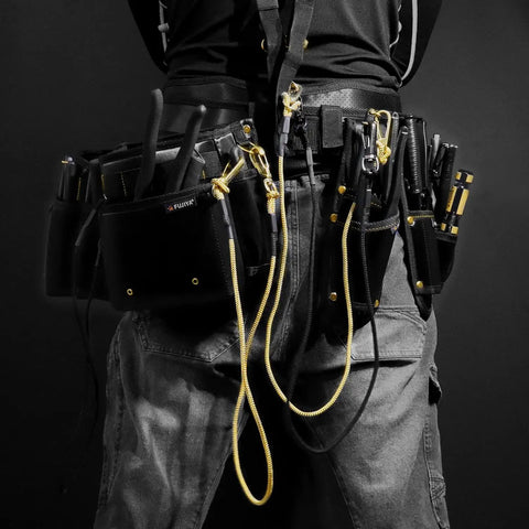 Worker's tool belt featuring Beefy High Leverage Pliers With Shackle In Black Gold Finish, safety cord visible, for electrical work.