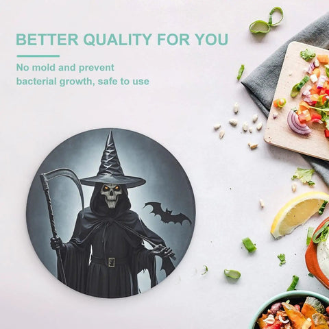 Death Scythe Round Tempered Glass Cutting Board With Non-Slip Rubber Feet, kitchen counter protector next to salad