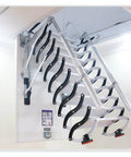 Pro Grade Electric Heavy Duty Retractable Attic Ladder With Hella Tough Aluminum Frame and Wide Non Slip Steps showing sturdy steps and handrails.