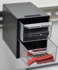 Two-Drawer Control Panel Organizer for DIN Rail Or Flat Surface With One-Click Toolless Install and adhesive mount, holding fuses.