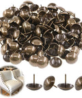 Top Shelf 100 Pack Bronze Upholstery Tacks 1 Inch Furniture Nails in a pile, showing antique brass finish and rounded heads.