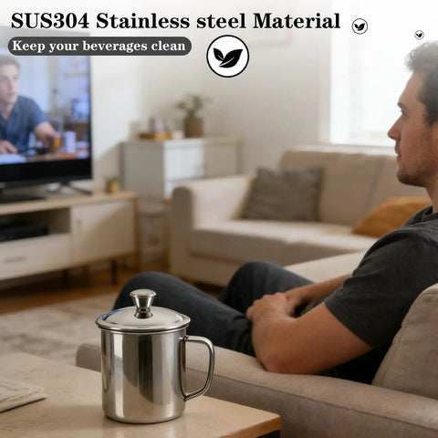 Solid Stainless Steel Universal Mug Lid keeps your morning grind hot and clean with ergonomic grip on a coffee table.