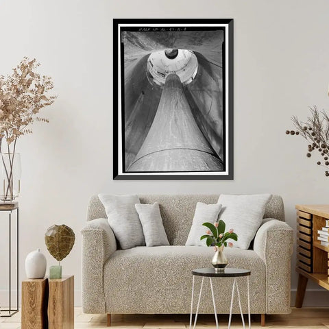 Framed Print Of Wilson Dam And Hydroelectric Plant With Turbine And Generator Spanning The Tennessee River On Wilson Dam Road In Muscle Shoals Alabama Vintage Home Decor Reproduction From Library Of Congress 17 7/8 By 21 7/8 Inches Retro Wall Art displayed above a sofa