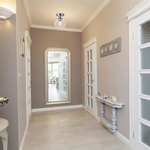 Harrow 1-Light Semi-Flush Mount Ceiling Light in chrome with clear glass shade illuminating a modern hallway.