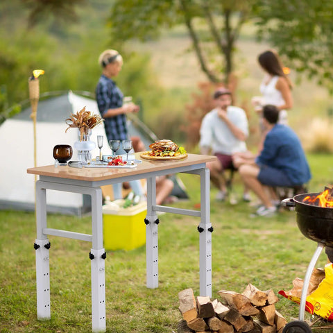 Level Up Your Setup With Four Piece White Metal Table Leg Extenders For Folding Desks Adjustable Height Risers on picnic table.