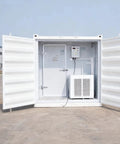 Custom Built Walk In Cold Storage Container With A Badass Commercial Refrigeration Setup And Clean Stainless Steel Interior For Rock Solid Frozen Inventory Holding - open doors revealing refrigeration unit and interior.