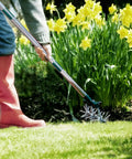 Gardener using 63 Inch Long Handle Rotary Tiller For Easy Gardening Adjustable From 25 To 63 Inches Aluminum Detachable Tines Hand Garden Cultivator.