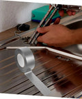 Heavy Duty Duct Tape Sealing Tape for Indoor and Outdoor Use Quick Fix Pipe Leaks and Repairs Base Waterproof Cloth Tape You Can Tear by Hand Sticks Fast and Holds Tough for Household Garage and Outdoor Projects shown on kitchen sink repair