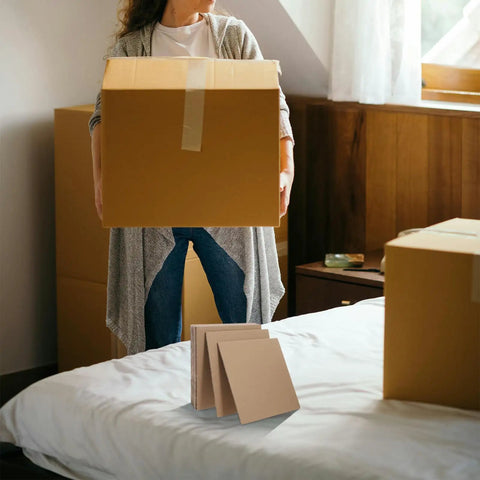 12 Pack Cardboard Box Dividers For Moving And Packing Supplies Protective Filler Pads For Fragile Items shown on a bed