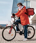 Person riding bike with Everyday Durable 29 Inch Bike Inner Tube 29x2.125 To 2.40 With AV32mm Schrader for city roads