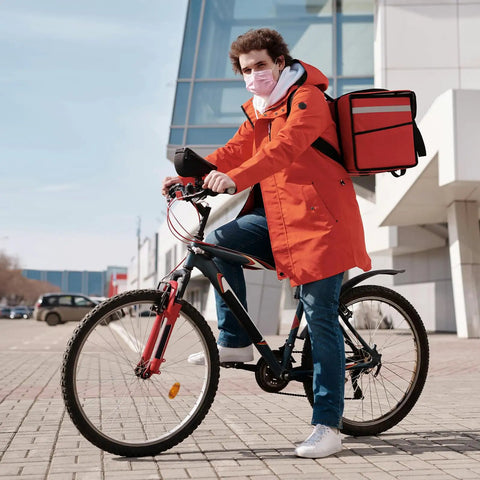 Person riding bike with Everyday Durable 29 Inch Bike Inner Tube 29x2.125 To 2.40 With AV32mm Schrader for city roads