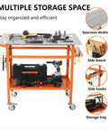 Rugged 36 Inch By 24 Inch Welding Table With 800 Pound Capacity Portable Welding Workbench On Wheels Two Brake Wheels And Four Adjustable Feet Side Hanging Board For Quick Access Tools Ideal For Garage Workshop, featuring multiple storage spaces and tools.
