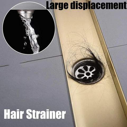 Slick Rectangular Shower Trench Drain With Stainless Steel Grate And Bamboo Hair Strainer showing hair strainer in use.