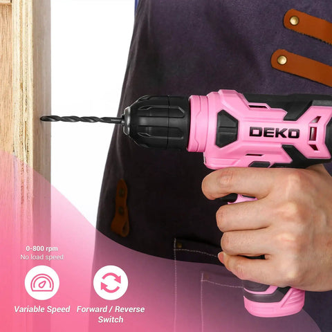 Person using Pink 8V Cordless Drill Kit With Three Eighths Inch Keyless Chuck And Forty Two Accessories Built In LED And Type C Charging Cable Perfect For Light Drilling And Screw Driving At Home And DIY Projects against wood
