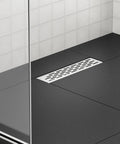 12 Inch Shower Drain With Removable Strainers In Brushed Nickel Finish High Flow Shower Drain Base For Bathroom Easy Install With A Hair Catcher V Shaped Slope Delivers 36 Lpm Without Mesh Or 18 Lpm With Mesh 2 Inch Outlet US Plumbing Connection cUPC installed on black bathroom floor