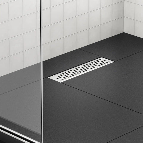12 Inch Shower Drain With Removable Strainers In Brushed Nickel Finish High Flow Shower Drain Base For Bathroom Easy Install With A Hair Catcher V Shaped Slope Delivers 36 Lpm Without Mesh Or 18 Lpm With Mesh 2 Inch Outlet US Plumbing Connection cUPC installed on black bathroom floor