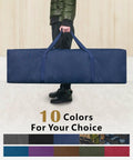 Person holding Massive 46 Inch Extra Large Zippered Duffel Bag For Travel Camping And Sports Gear Storage Waterproof Foldable Luggage