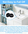 Close-up of two black silicone plugs from the 125 Piece Silicone Rubber Hole Plugs Kit in a bathroom context, highlighting snap-fit design.