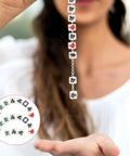 Woman holding a string of 100 Pcs Mahjong Beads For Jewelry Making With Pre Drilled Holes Charms, polymer clay tiles in assorted colors.