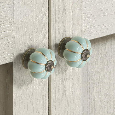 Close-up of installed sky blue ceramic pumpkin knobs from 5 Pack Retro Vintage Ceramic Pumpkin Cabinet Knobs Set For Kitchen Cabinets Drawers.